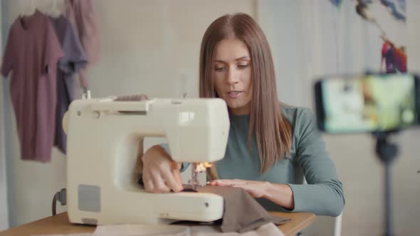 Woman Sewing With Sewing Machine