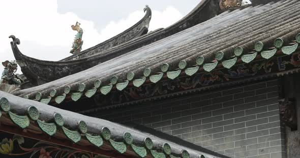 Traditional chinese building with statue