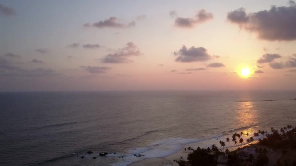 Bright Evening Sunlight Reflected in Endless Ocean Water