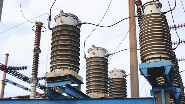 High Voltage Substation With Tall Pylons and Voltage Distribution Cables