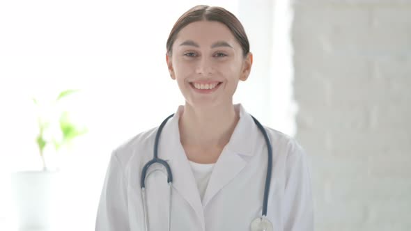 Portrait of Female Doctor Showing Yes Sign by Head Shake