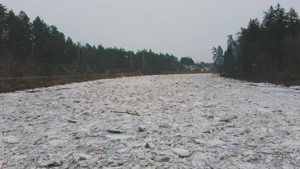 Aerial Dron Shot of the Huge Ice Loads Drift in the River Ogre, Latvia. 4K Video