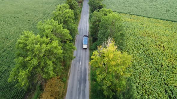 The Movement of the Truck on the Asphalted Country Road