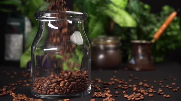 Slow Motion Empty Transparent Jar Filled with Coffee. Can Stay on Black Table.