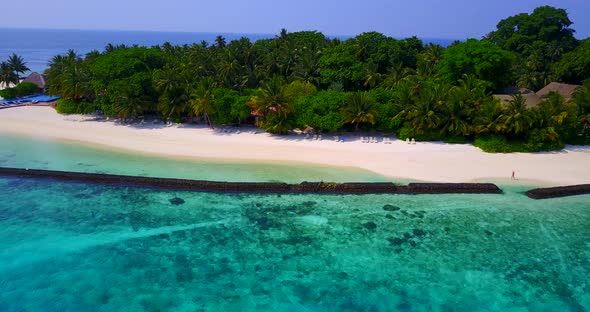 Luxury birds eye island view of a sandy white paradise beach and blue sea background in best quality