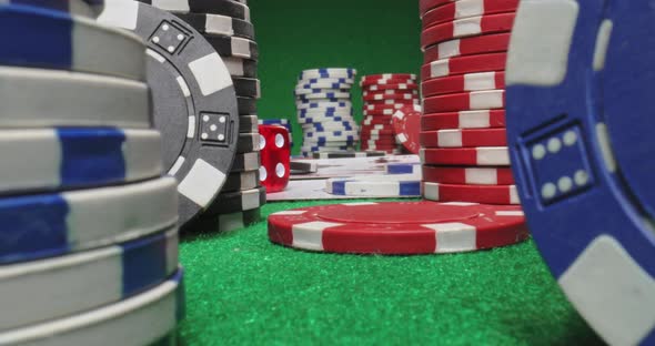 Green table and texas holdem. Poker with chips and cards.