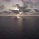 Sunrise over the sea. Epic view of the ocean and reflection of clouds and sun. - VideoHive Item for Sale