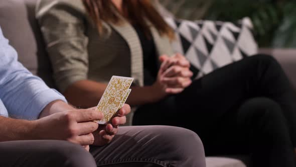 Married Couple Working with Metaphorical Cards