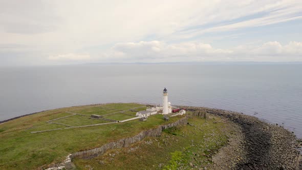 The Island of Pladda off the South Coast of Arran in Scotland with a Lighthouse