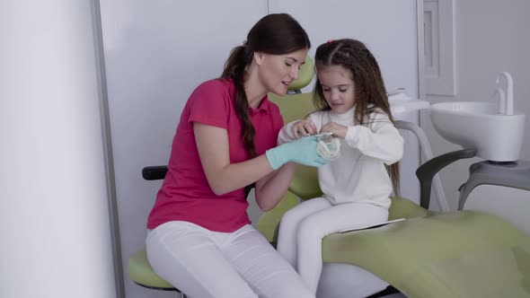 The Dentist Counseling Lovely Childpatient Using Playful Method with Jaw Layout