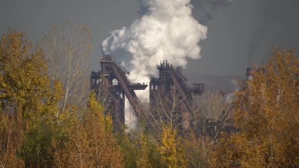 Air pollution over the city by emissions from industrial chimneys