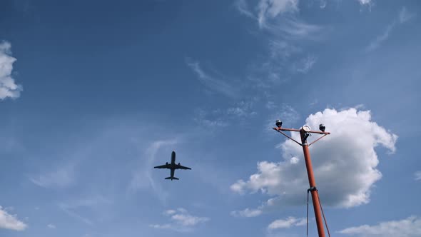 Plane Takes Off From Airport and Flies Overhead