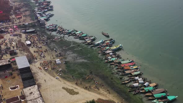Aerial view of canoe and fishing boats along the river, Bangladesh.