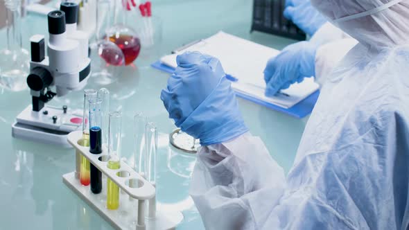 Researcher Working in High Security Laboratory alt