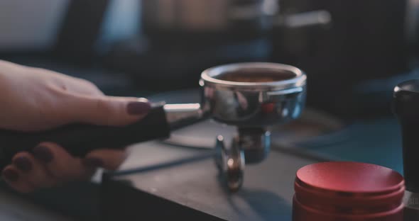 Making Ground Coffee with Tamping Fresh Coffee. Close-Up. Making Coffee From Start To finish.Tamping