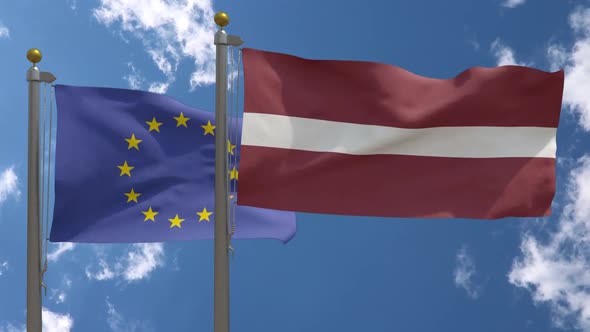 European Union Flag Vs Latvia Flag On Flagpole