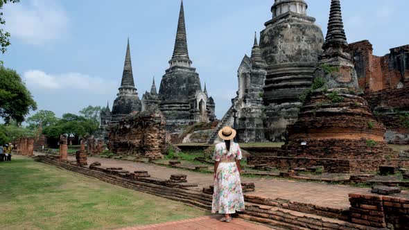 Ayutthaya Thailand at Wat Phra Si Sanphet Women with a Hat and Tourist Map Visiting Ayyuthaya