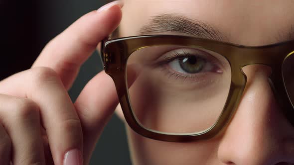 Extreme Closeup of Half Face Shoot of Attractive Female Face in Glasses