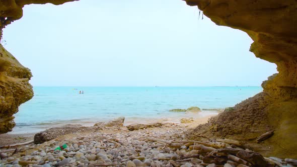 Cave in the Rock By the Sea in Summer