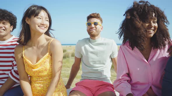 Group of friends having fun on the beach.