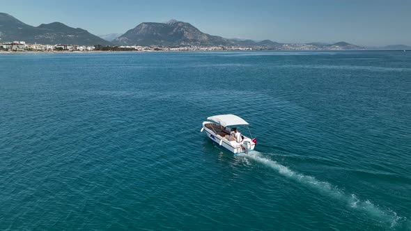 Fishing boat goeas to sea aerial view Turkey Alanya 4 K