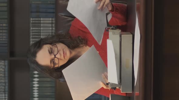 Focused Woman Writing Article or Novel Indoors