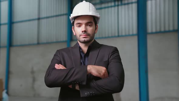 Portrait Confident Factory Manager Wearing Suit and Safety Helmet