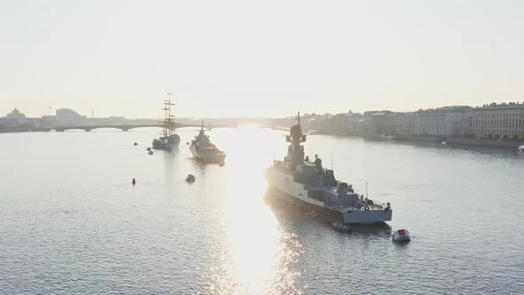 Aerial Morning Cityscape with Warships in the Waters of the Neva River Before the Holiday of the