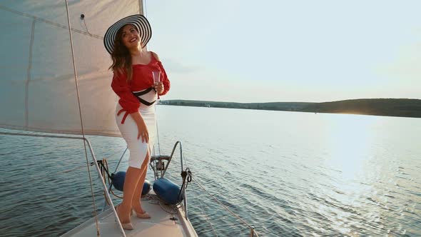 Plus Size Woman with Wine Glass on Sailing Boat