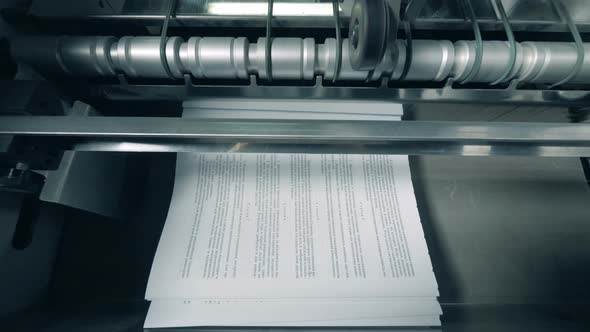 Typographic Machine Is Issuing and Relocating Printed Paper