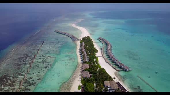 Aerial drone shot nature of tropical resort beach vacation by aqua blue ocean with bright sandy back