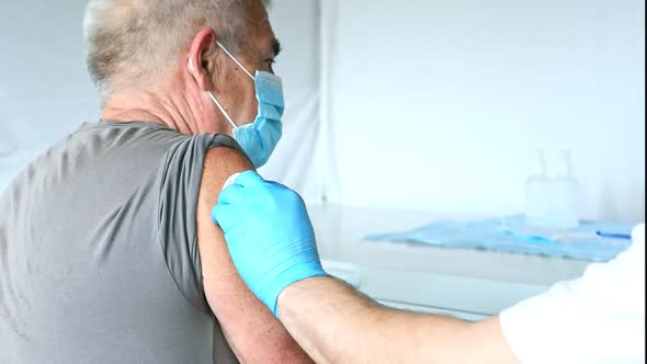 Elderly Man Getting Covid Vaccine