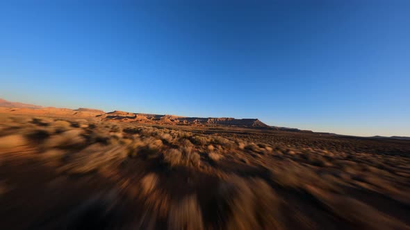 Desert Landscape Foliage Fast Flying Over Bushes Mesa View Blue Sky