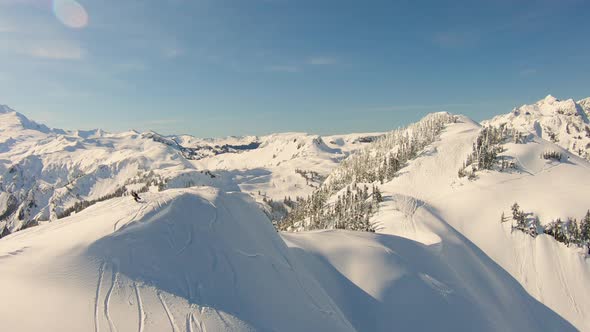 Mountaineer Snowboarder Hiking Mount Baker Shuksan Arm Top Ridge Aerial View Flying By Extreme Sport