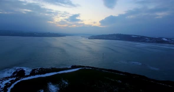 Aerial view of sea at dusk 4k