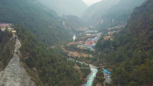 Fly Away From Beautiful Valley With River And Villages