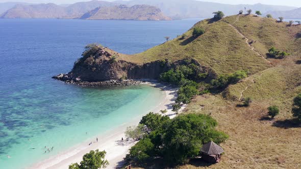 Aerial view of Pink Beach and Coral lined waters of Komodo National Park, Flores, Indonesia.
