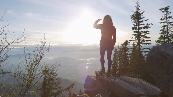 Adventurous Caucasian Adult Woman Hiking in Canadian Nature