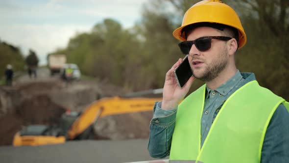 Portrait of an Engineer Talking on the Phone