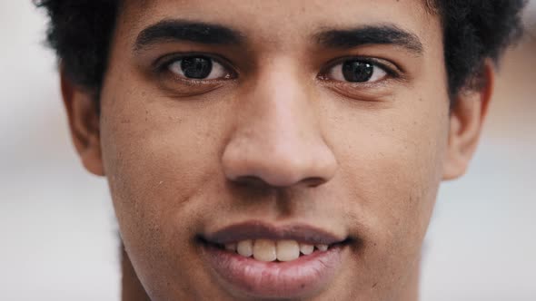 Extreme Close Up Young African Dominican Biracial Male Smiling Face Part
