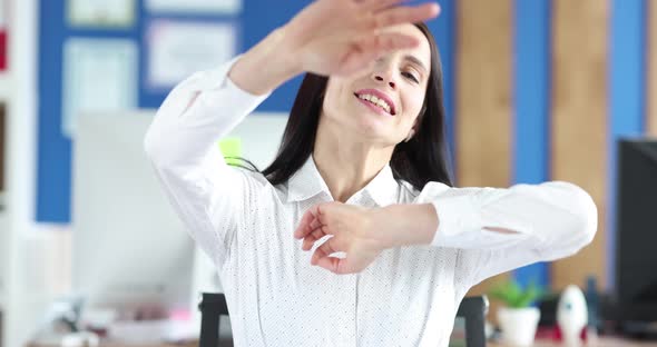 Woman Waving Her Hands at Table in Office  Movie Slow Motion