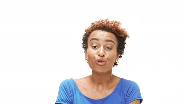 Nervous Displeased Young Beautiful African Girl Over White Background