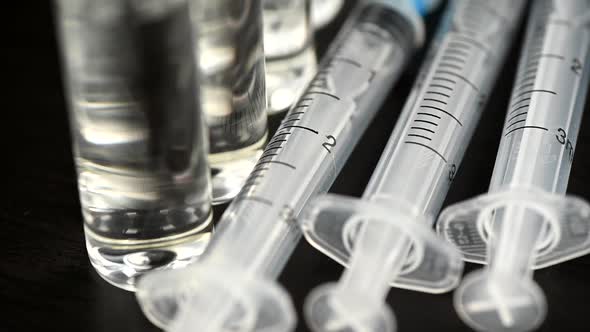 Medical Syringes and Medical Ampoules for Vaccination on the Table