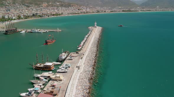 The Drone Flies to the Lighthouse in the Port of Alanya