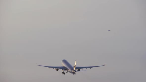 Jet Plane Closing Its Landing Gear