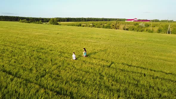 Family Walking Around Field