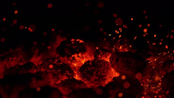 Super Slow Motion Shot of Glowing Coal and Fire Sparks at 1000Fps