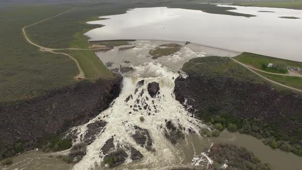 Aerial view of huge overflow waterfall at Magic Reservoir