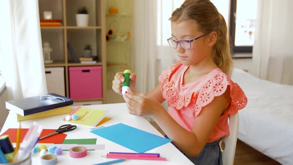 Creative Girl Making Greeting Card at Home