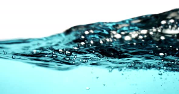 Slow motion blue water ripples on a white background alt